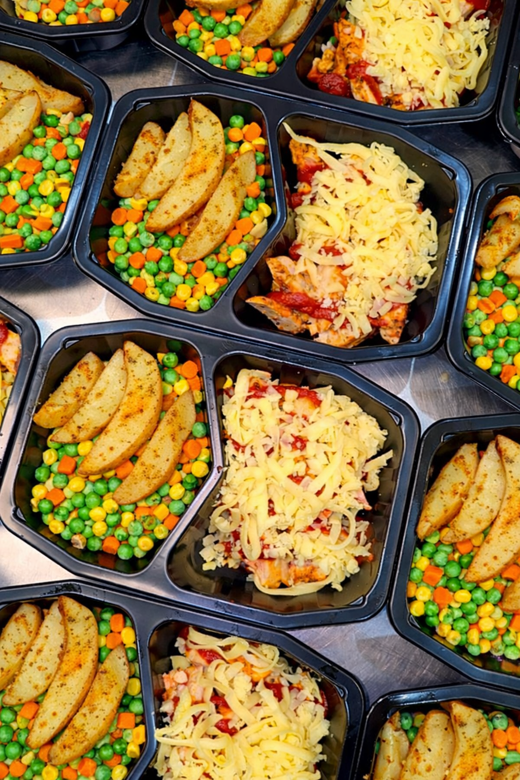 chicken parma with roast potato and veggies